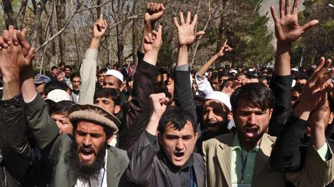 Afghans rally in Kabul to slam Qur