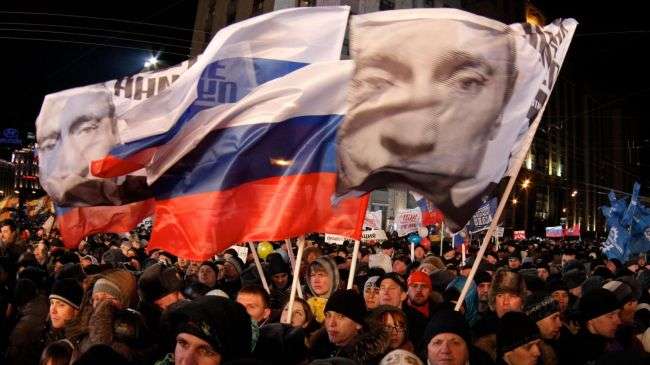 Supporters of Russian president elect Vladimir Putin celebrating his victory.