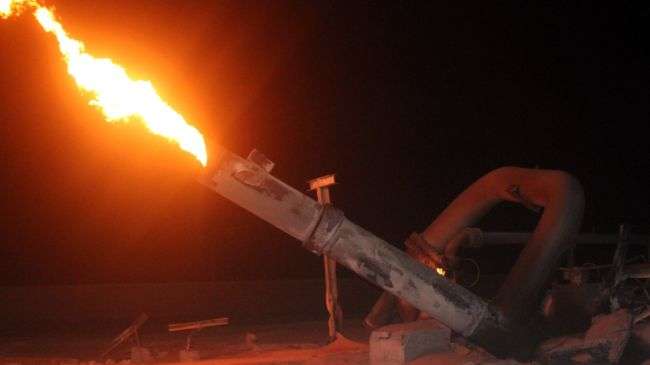 A pipeline delivering gas from Egypt to Israel burns following an attack near the town of al-Arish in the northern Sinai, September 27, 2011.