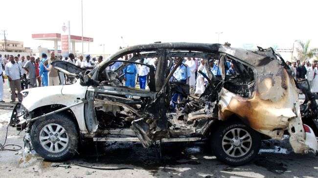 A general view shows the burnt out vehicle following the car explosion in Port Sudan on May 22, 2012