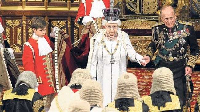 The British Queen and her husband at the State Opening of Parliament in May 2012