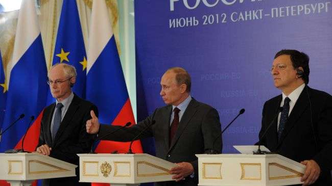 Russia President Vladimir Putin (C), European Commission President Jose Manuel Barroso (R), and European Council President Herman Van Rompuy (L) attend a press conference after a Russia-EU summit in Strelna, outside Saint Petersburg, on June 4.