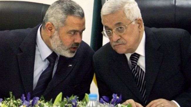 Acting Palestinian Authority chief Mahmoud Abbas (R) Hamas leader Ismail Haniyeh (File Photo)