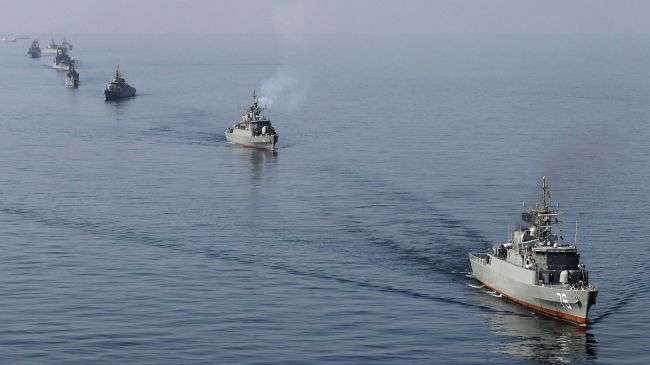 File photo shows Iranian Navy boats during the Velayat-90 war game in the Strait of Hormuz in southern Iran on January 3, 2012.