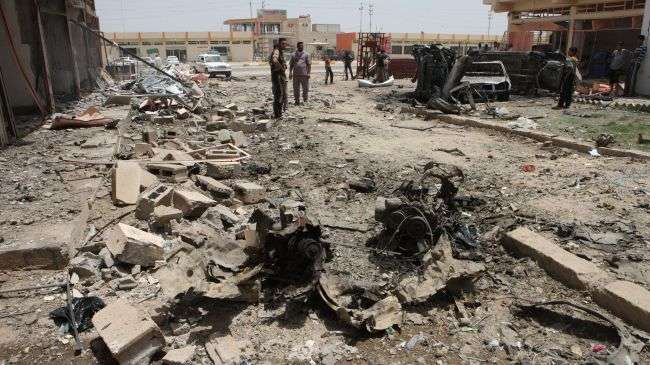 Bomb attacks, shootings kill 91, injure dozens in Iraq