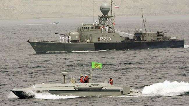 Iranian naval vessels during a military drill near the Strait of Hormuz