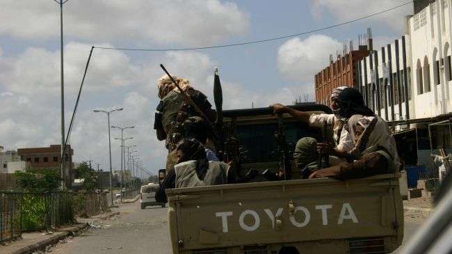 Yemeni militants patrol on their pickups in the southern city of Zinjibar in Abyan province, April 28, 2012.
