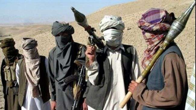 Tehreek-e-Taliban Pakistan (TTP) militants pose for a photo in an unknown location.