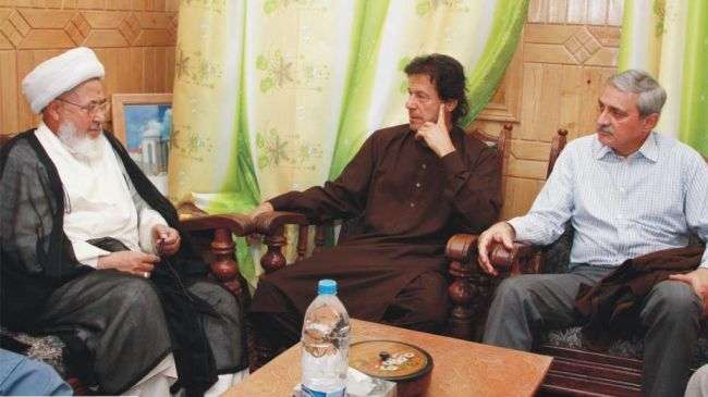 Imran Khan (C) meets with Sheikh Muhammad Hassan Jaffery (L) in Skardu, the main city in northern region of Gilgit–Baltistan, Pakistan, on September 2, 2012.
