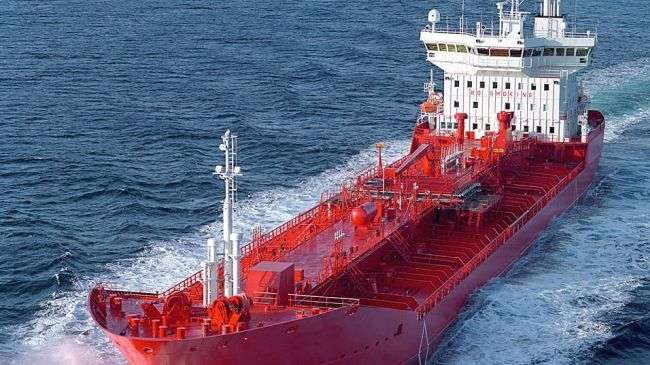An oil tanker, carrying crude, sails in international waters.