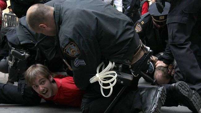 New York police officers arrest a protestor during an Occupy Wall Street demonstration.