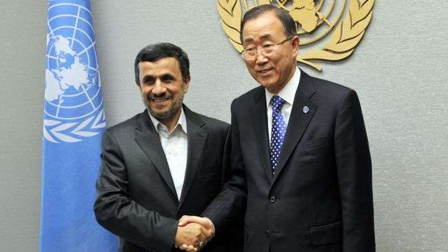 Iranian President Mahmoud Ahmadinezhad (L) shakes hands with United Nations Secretary General Ban Ki-Moon before their meeting at UN headquarters in New York on September 23, 2012.