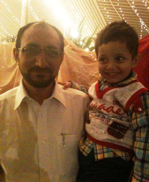 شہید سید علی رضا تقوی (رہ) کی اپنے بیٹے کے ہمراہ یادگار تصویر
