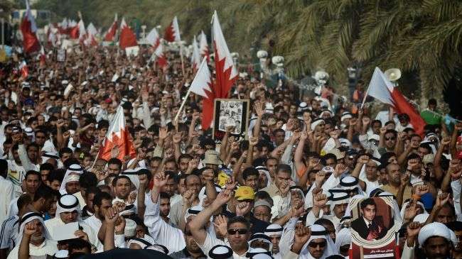 Bahraini protesters march during a demonstration following Friday noon prayers in the Shiite Muslim village of Barbar, west of the Bahraini capital Manama, May 4, 2012.