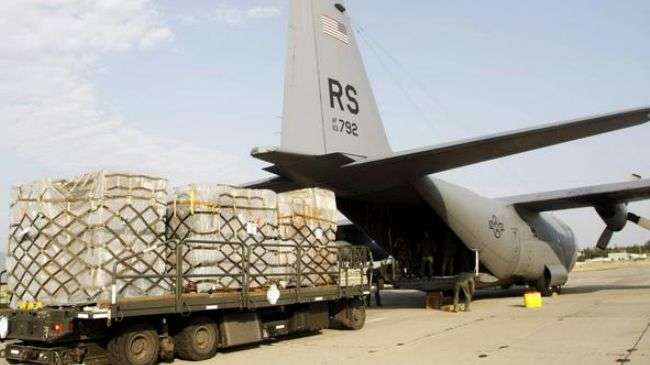 Soldiers unloading a US military cargo plane at Tbilisi airport.