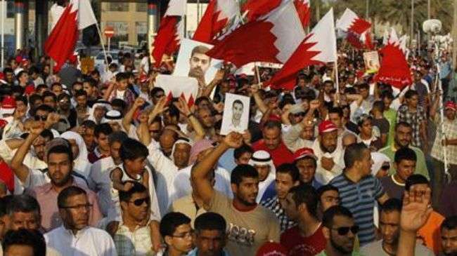 Bahraini protesters shout anti-regime slogans during a demonstration in Manama on September 28, 2012.