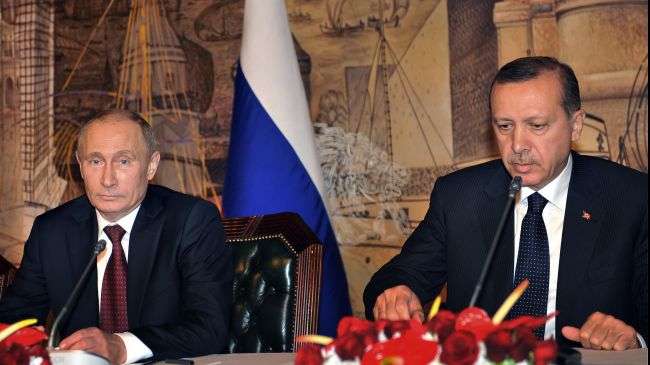 Turkish Prime Minister Recep Tayyip Erdogan (R) and Russian President Vladimir Putin give a press conference in Istanbul on December 3, 2012.