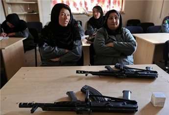 Afghan policewomen attend a training session in a classroom at the Afghan National Police Academy in Kabul, Dec. 9, 2012.