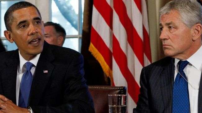 US President Barack Obama (L) and former Republican Senator Chuck Hagel