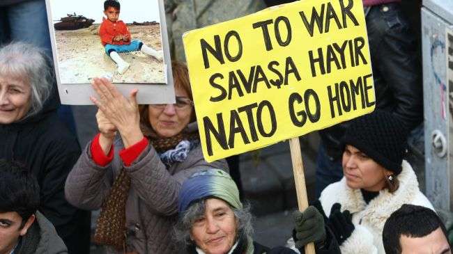 Turkish people protest the arrival of NATO’s Patriot missiles in the country.