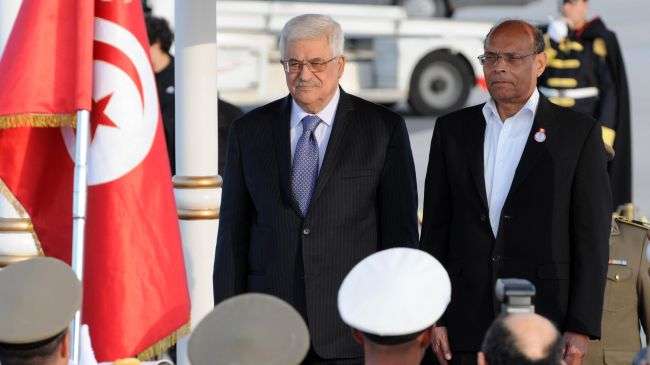 Acting Palestinian Authority Chief and Tunisian President Moncef Marzouki are seen prior to a meeting on January 14, 2013 in Tunis.