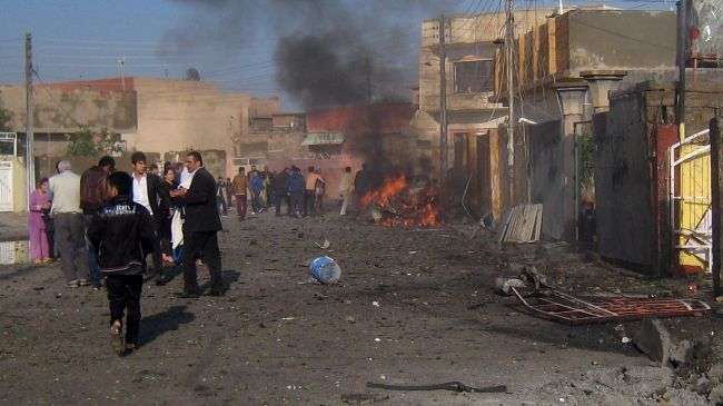 The site of a car bombing in the northern Iraqi city of Kirkuk