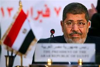 Egyptian President Mohamed Mursi attends the Organization of Islamic Cooperation summit in Cairo, Feb. 6.