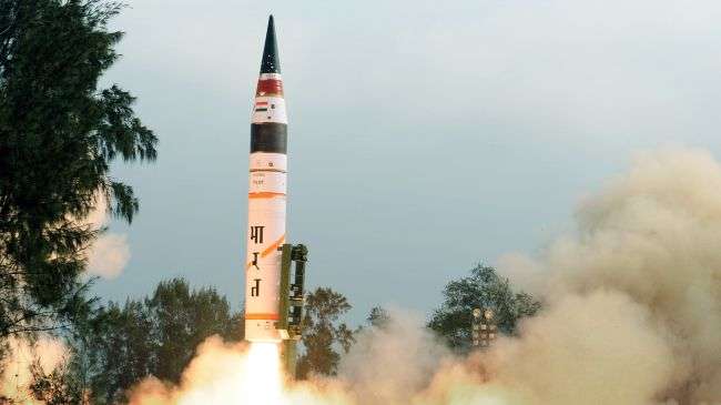 File photo shows a long range missile being fired from a mobile launcher from Wheeler Island, off the coast of India, in the Indian state of Orissa.