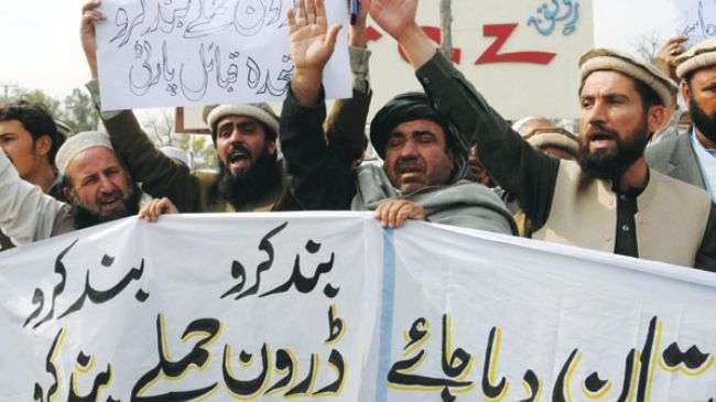 Pakistani tribesmen rally against US assassination drone attacks
