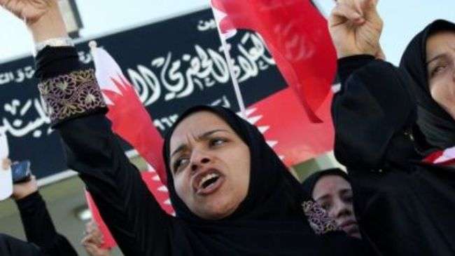 Teachers join anti-government protesters in the Bahraini capital Manama on February 20, 2011.