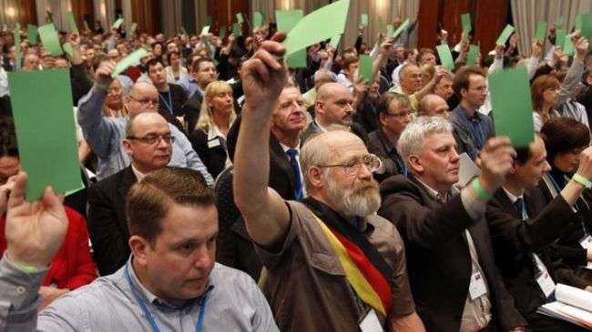 Members of the German anti-euro party, Alternative for Germany, cast their votes during the party’s founding convention in Berlin on April 14, 2013.