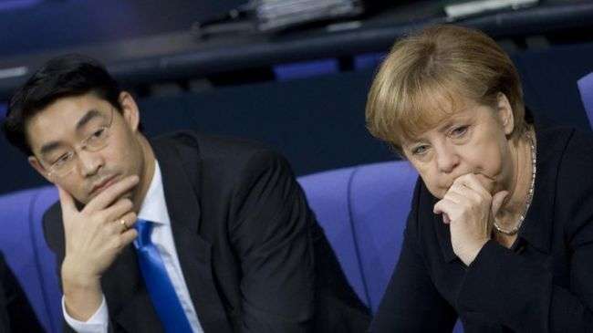 Coalition partner censures German Chancellor Angela Merkel