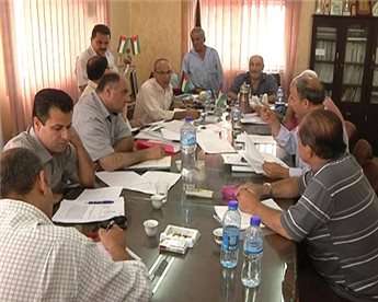 Lawyers and PA officials in the Qarawat Bani Hassan village in the northern West Bank district of Salift discuss ways to undercover the use of forged ownership documents used to expand Israeli settlements.