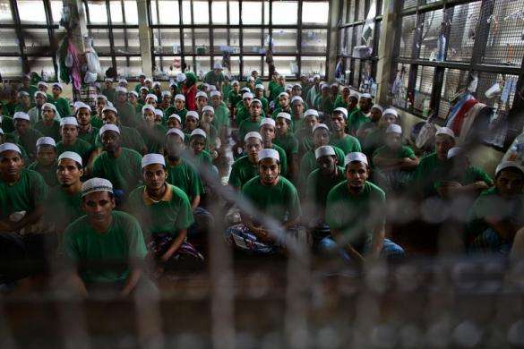 Rohingya Muslim illegal immigrants gather at the Immigration Detention Centre during the Muslim holy fasting month of Ramadan in Kanchanaburi province Myanmar July 10 2013.