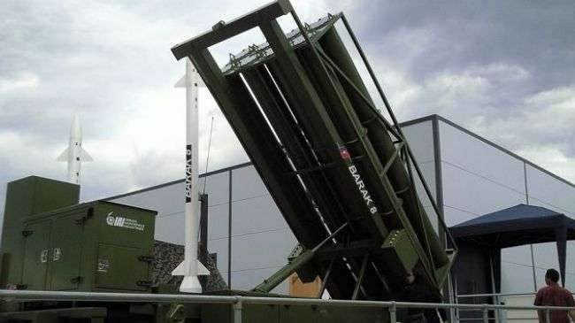 A Barak 8 missile battery is shown in the photo.