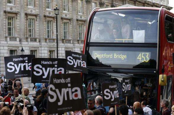 Protestors block Whitehall during a rally against the proposed attack on Syria in central London August 28 2013.