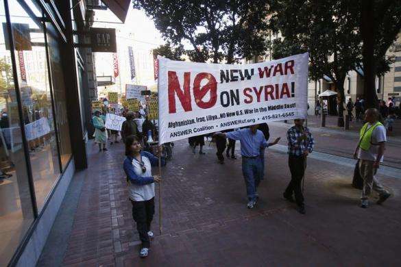 Demonstrators march in opposition to the proposed military intervention against Syria in San Francisco August 29 2013.