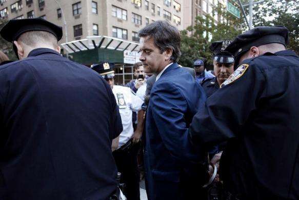 New York State Senator Brad Hoylman (D-NY) is detained for blocking traffic during Occupy Wall Street protest along 2nd Avenue in New York September 17 2013.