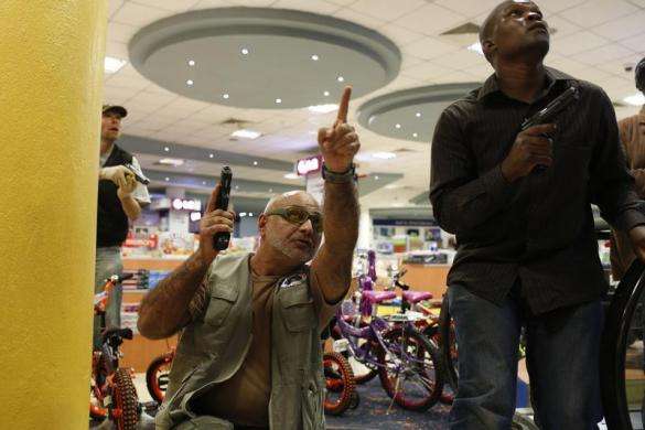 Security officers secure an area inside Westgate Shopping Centre in Nairobi September 21 2013.