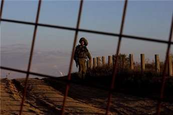 An Israeli soldier is seen on the border between Israel and the Gaza Strip on Nov. 15, 2012