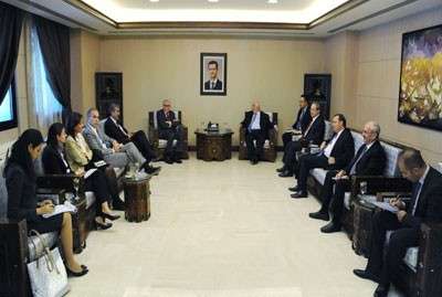 Moallem to Brahimi: Syria Will Participate in Geneva Conference