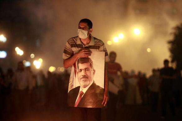 Egypt army-backed government cracked down hard on the Muslim Brotherhood after the army deposed former President Mohamed Mursi on July 3 after mass protests against his rule killing hundreds of its supporters and arresting thousands more. An injured supp