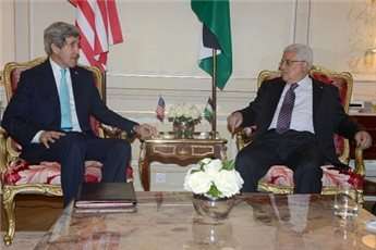 President Mahmoud Abbas meets with US Secretary of State John Kerry for their second round of talks in two days in Paris on February 20, 2014.
