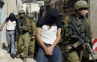 Israel arrests Palestinians in raid in the West Bank