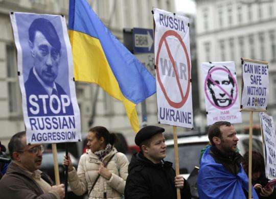 Members of Vienna Ukrainian community protest against Russian troops in Ukraine outside the U.S. embassy in Vienna March 4 2014.