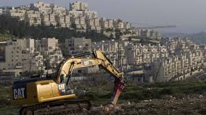France warns firms doing business in Israel settlements