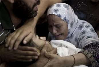 Gaza Humanitarian Truce Comes into Effect, Offensive Death Toll Nears 900