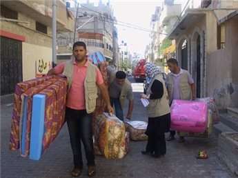 Amid destruction, ordinary Gazans open homes, churches to displaced