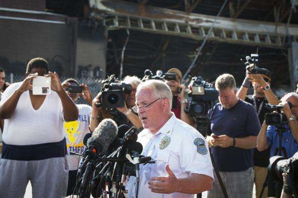 Ferguson Police Chief Thomas Jackson announces the name of the officer involved in the shooting of Michael Brown as officer Darren Wilson, in Ferguson, Missouri August 15, 2014.