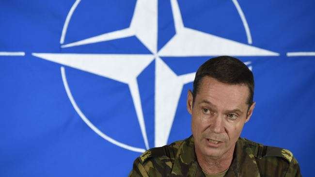 Senior NATO official Brigadier general Nico Tak speaks during a press conference focused on the crisis in Ukraine, in Casteau, near Mons, Belgium, August 28, 2014.